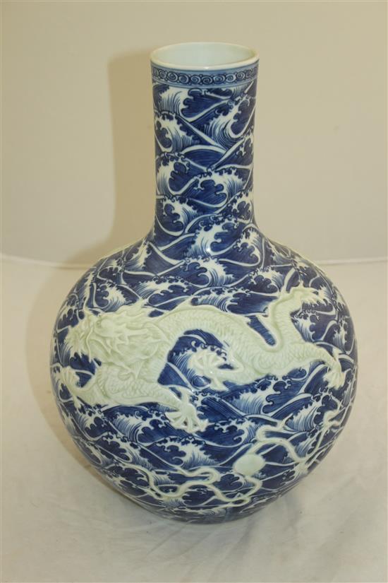 A Chinese blue and white dragon vase, 34cm